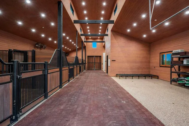 a view of a hall with stairs