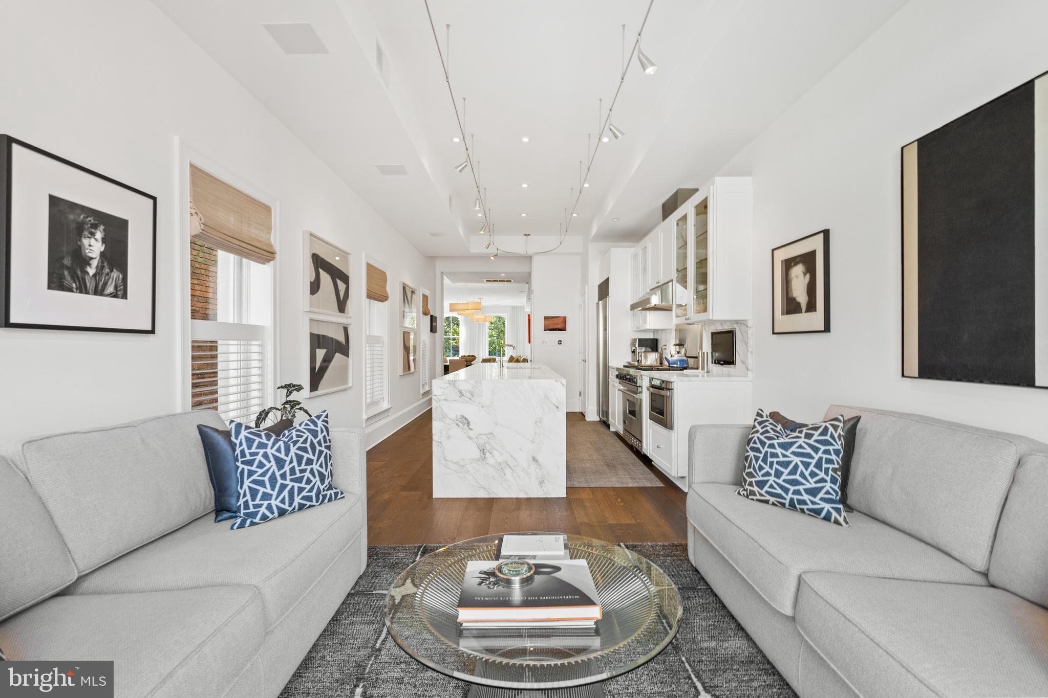 1341 Q Street Northwest, Unit B Washington, DC 20009 - Photo 10 of 31 a living room with furniture and a couch