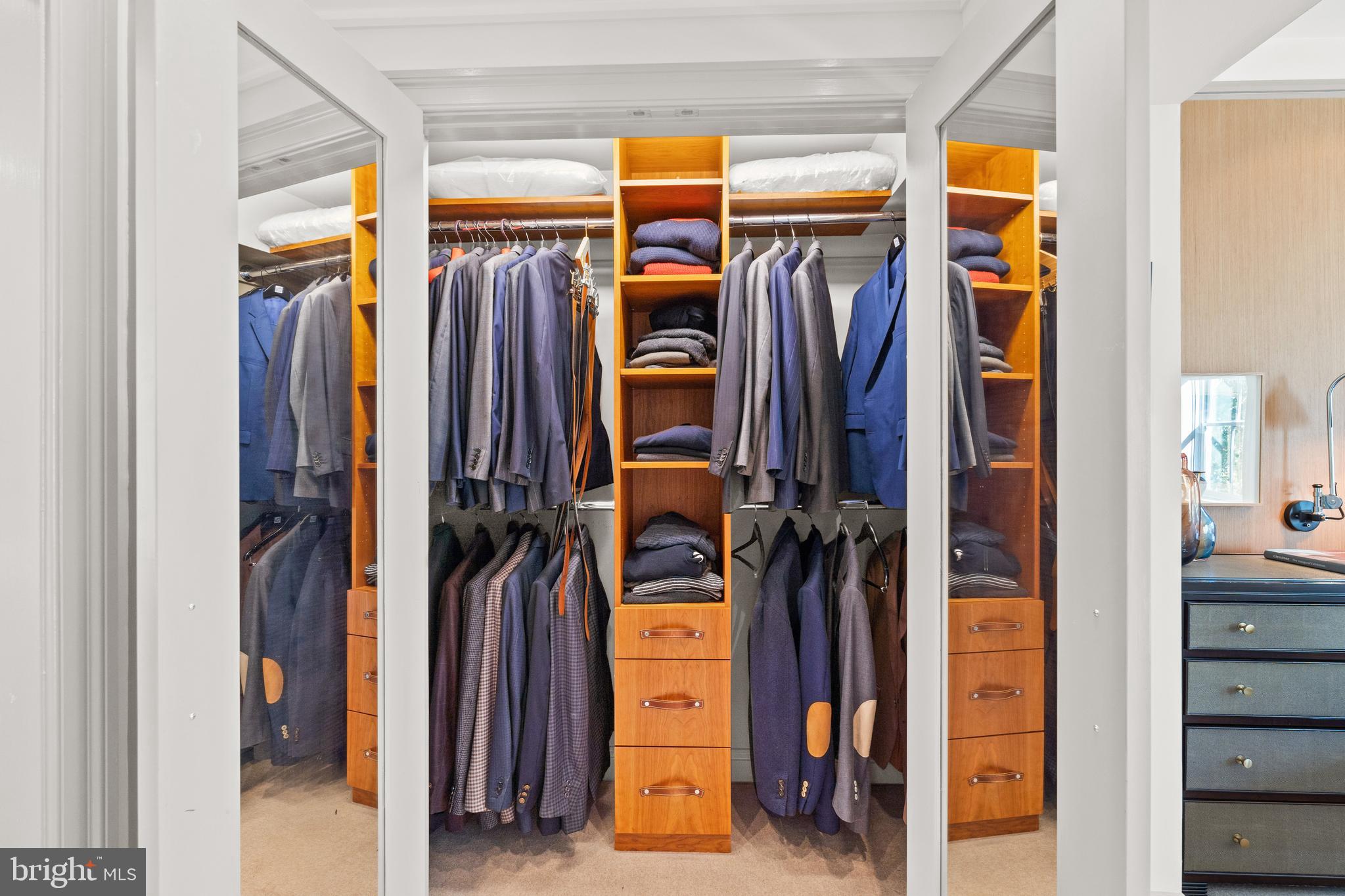 1341 Q Street Northwest, Unit B Washington, DC 20009 - Photo 18 of 31 a view of walk in closet with clothes