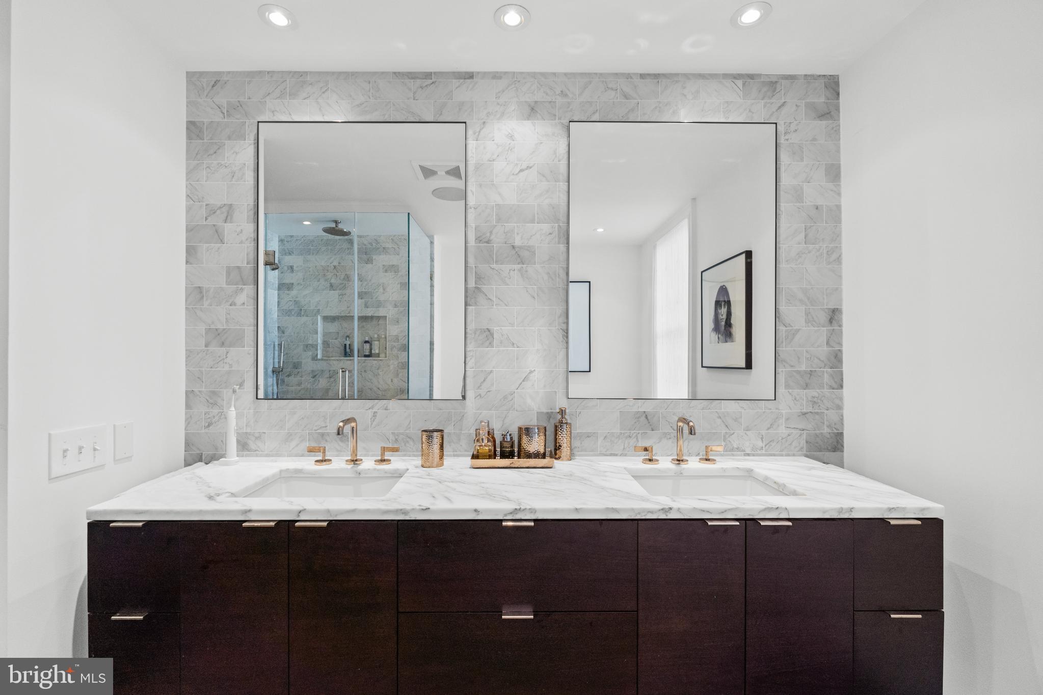 1341 Q Street Northwest, Unit B Washington, DC 20009 - Photo 20 of 31 a bathroom with double sink and a mirror