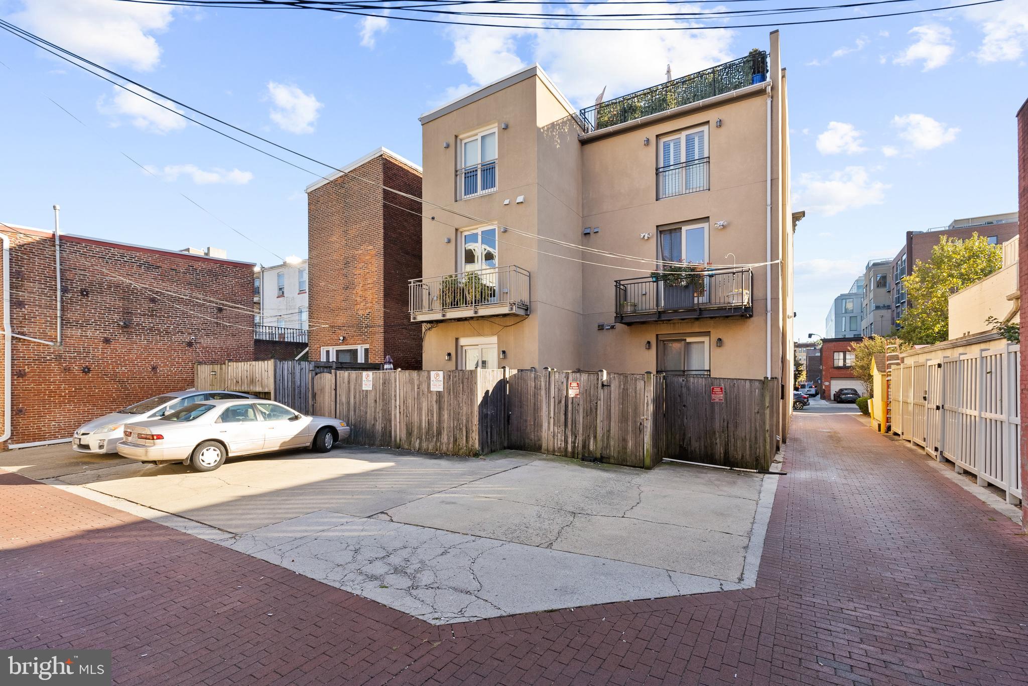 1341 Q Street Northwest, Unit B Washington, DC 20009 - Photo 29 of 31 a bedroom with furniture and a book shelf