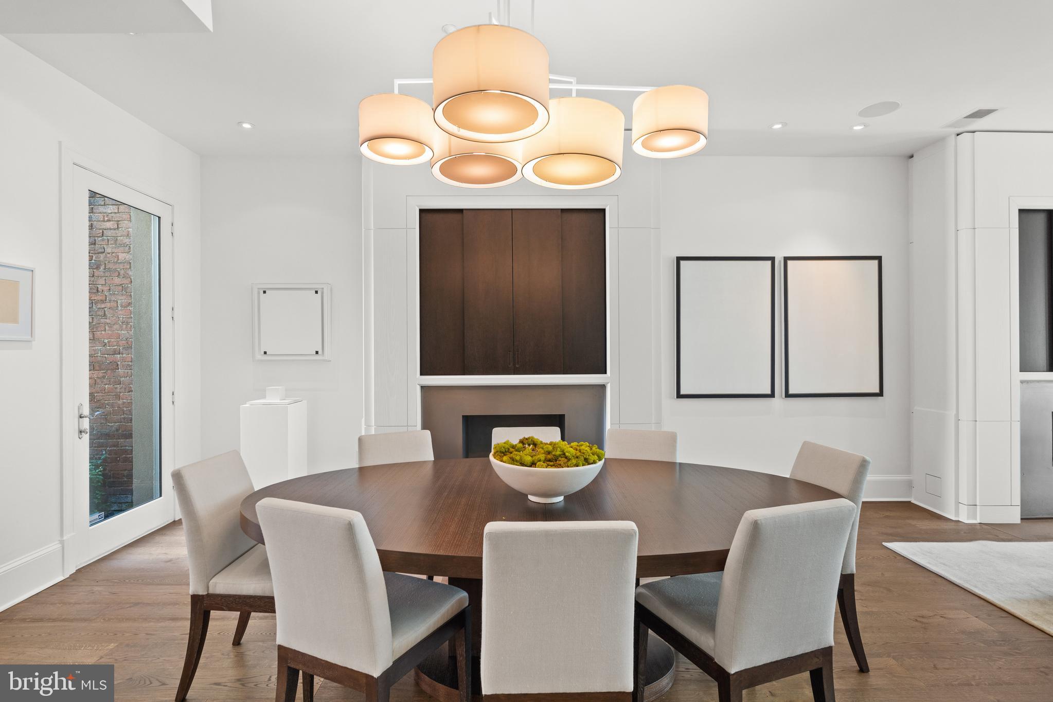 1341 Q Street Northwest, Unit B Washington, DC 20009 - Photo 4 of 31 a view of a dining room with furniture and wooden floor