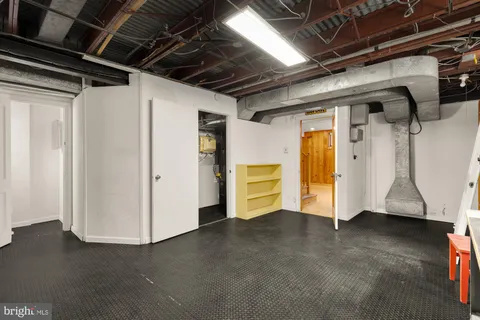 a view of a room with wooden walls