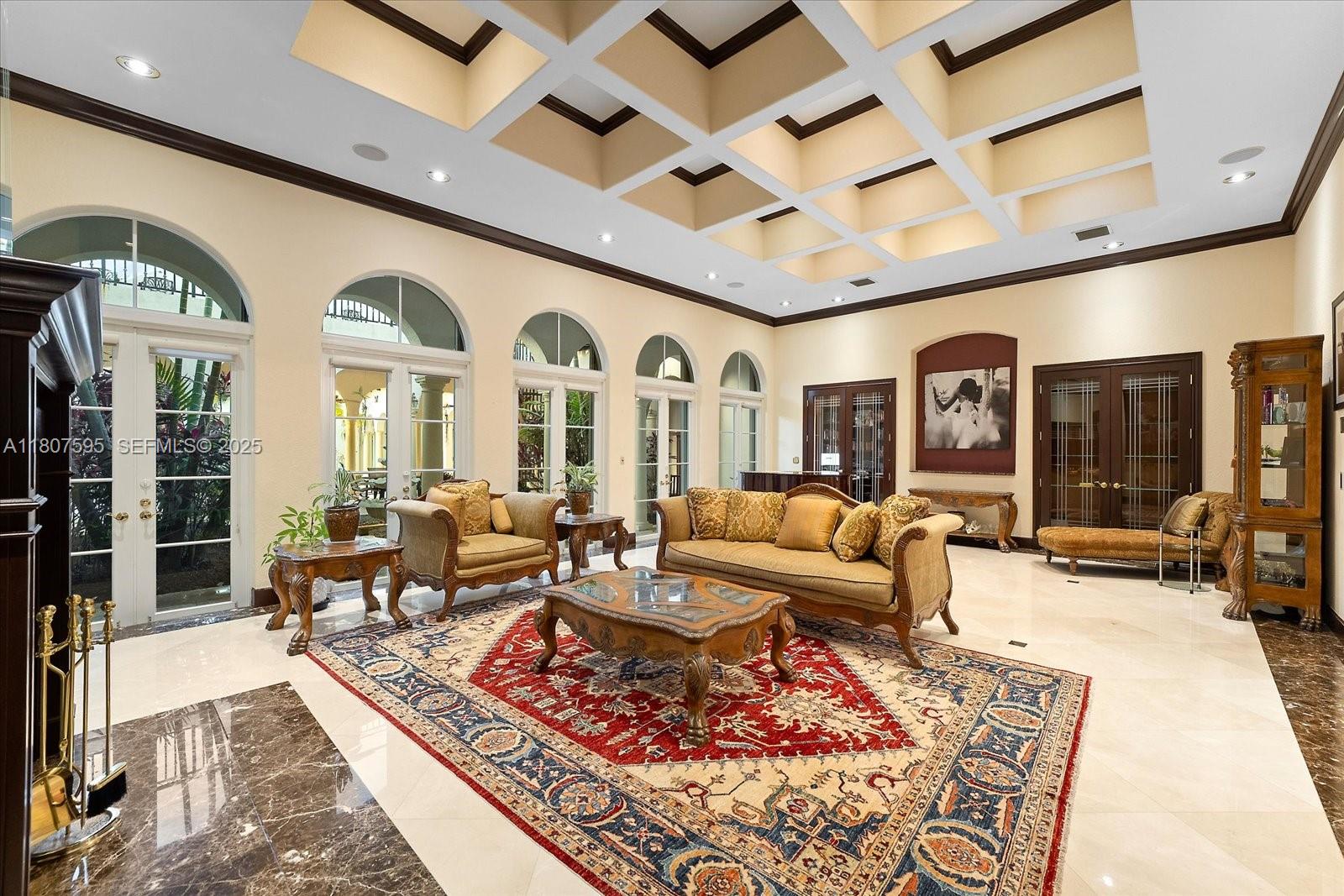 18451 Southwest 158th Street Miami, FL 33187 - Photo 11 of 45 a living room with lots of furniture and a rug