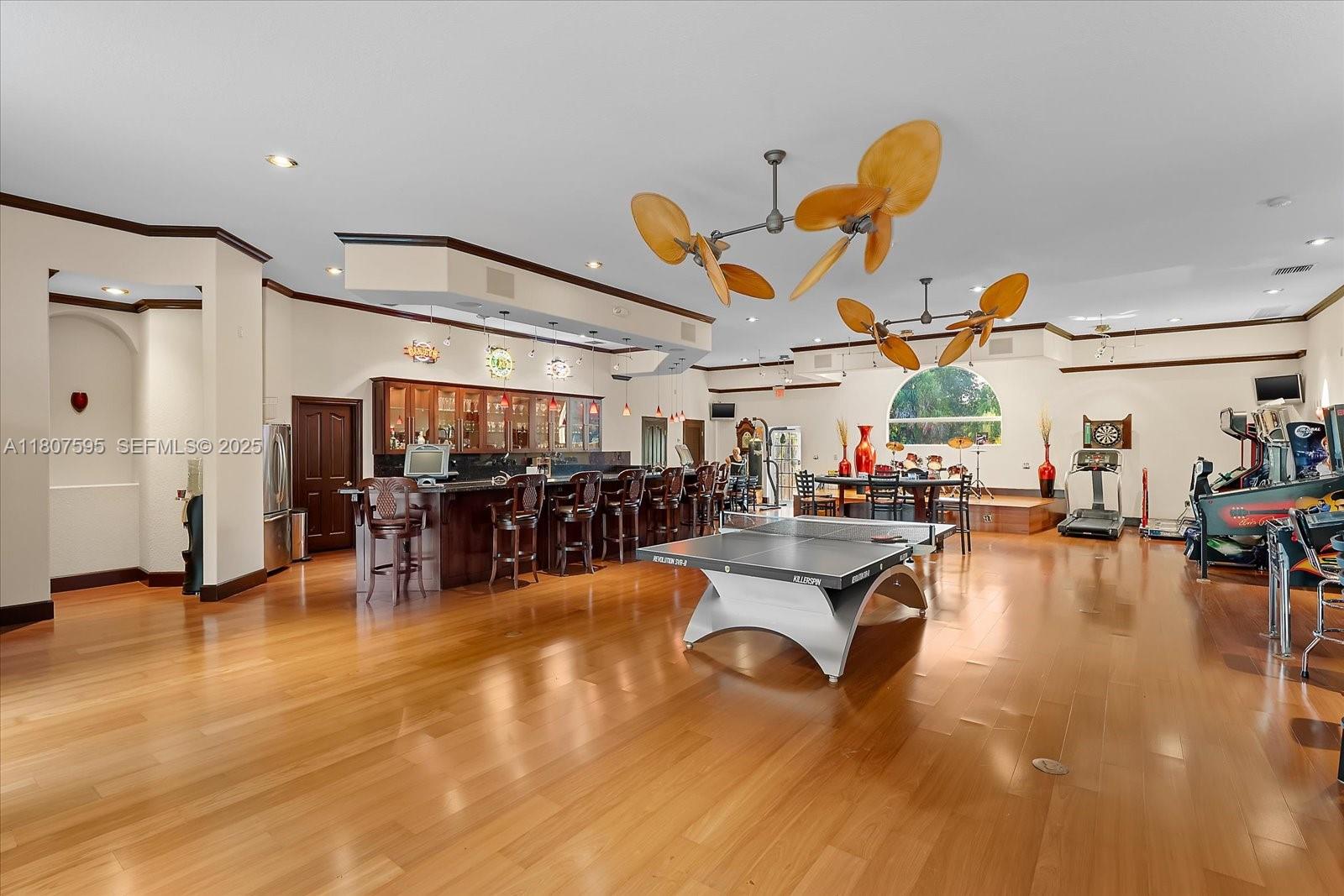 18451 Southwest 158th Street Miami, FL 33187 - Photo 13 of 45 a view of a room with gym equipment