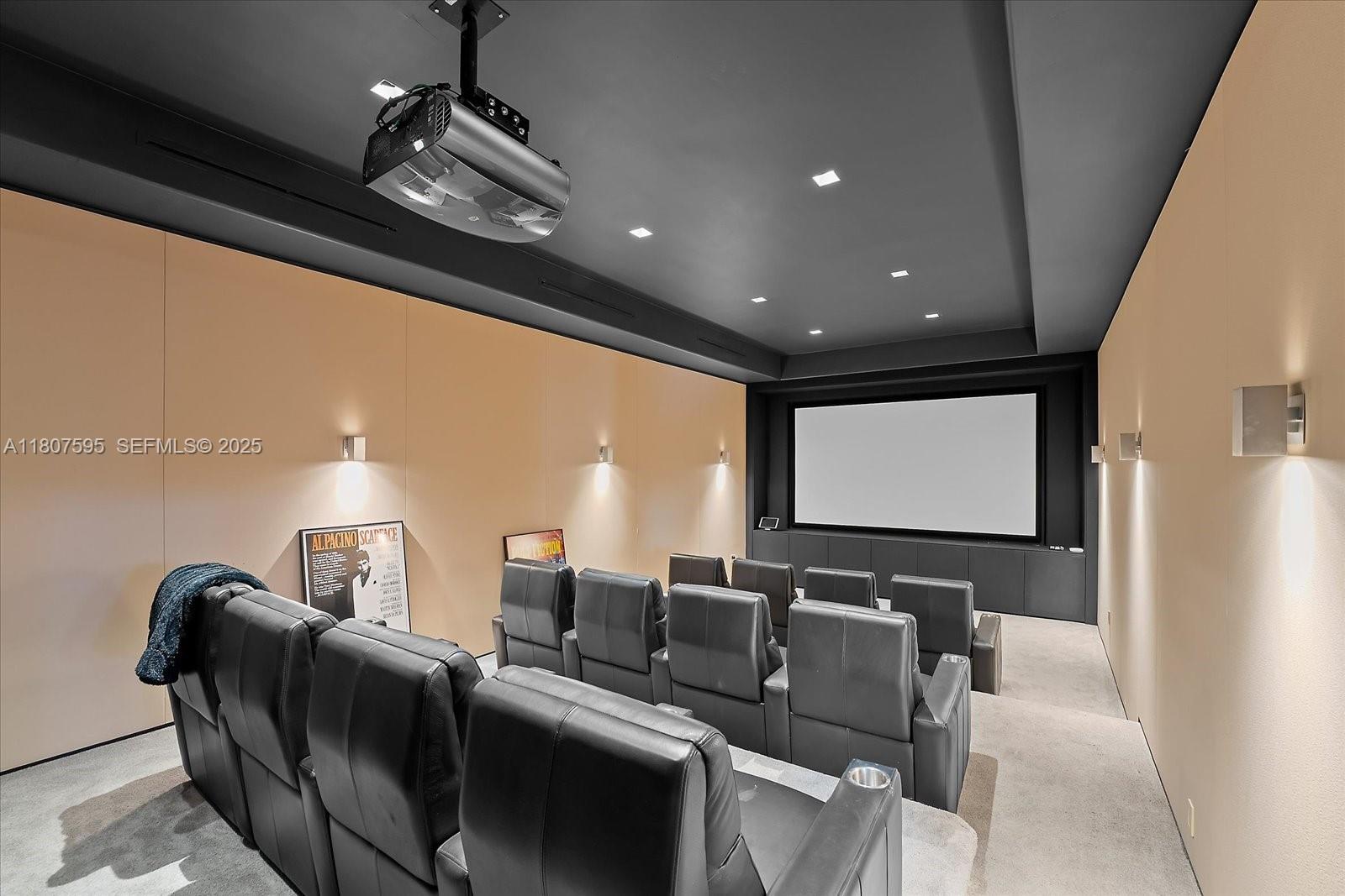 18451 Southwest 158th Street Miami, FL 33187 - Photo 26 of 45 a media room with lots of chairs and a projector screen
