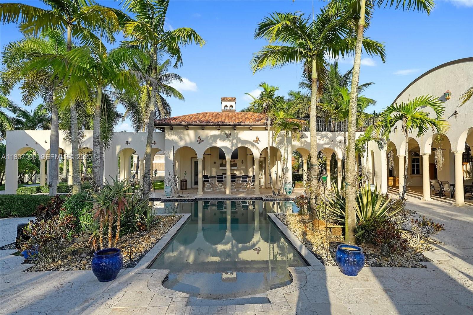 18451 Southwest 158th Street Miami, FL 33187 - Photo 32 of 45 a view of outdoor space yard and porch