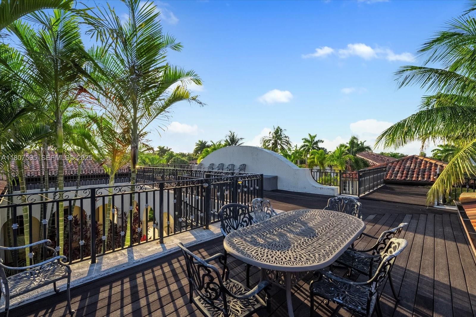 18451 Southwest 158th Street Miami, FL 33187 - Photo 34 of 45 a view of a chairs and table in patio