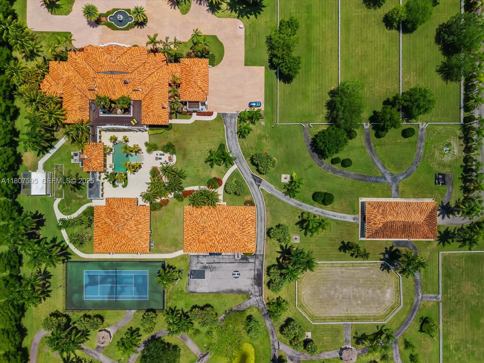 18451 Southwest 158th Street Miami, FL 33187 - Photo 39 of 45 an aerial view of residential house with outdoor space and parking