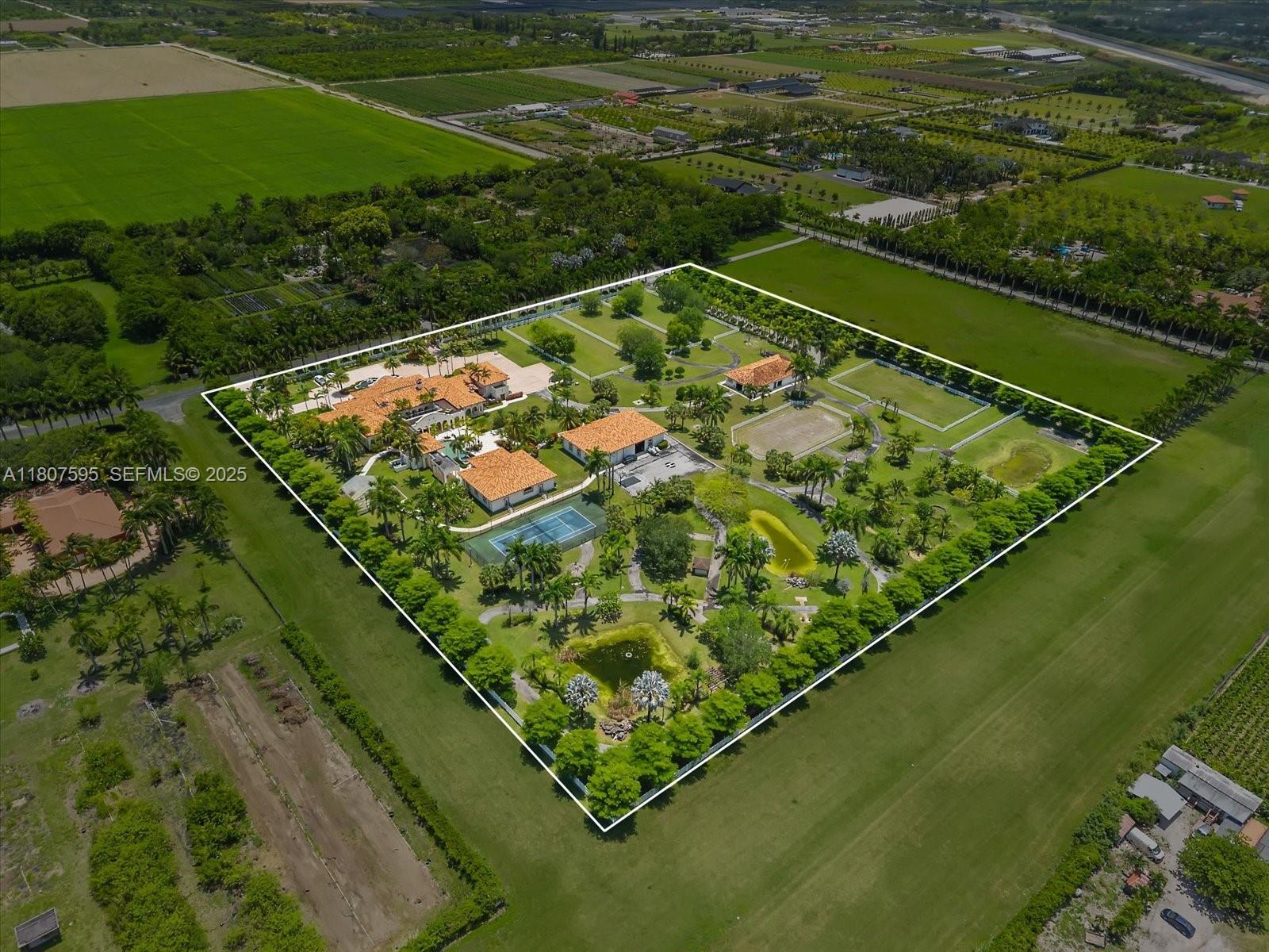 18451 Southwest 158th Street Miami, FL 33187 - Photo 45 of 45 a view of a tennis court