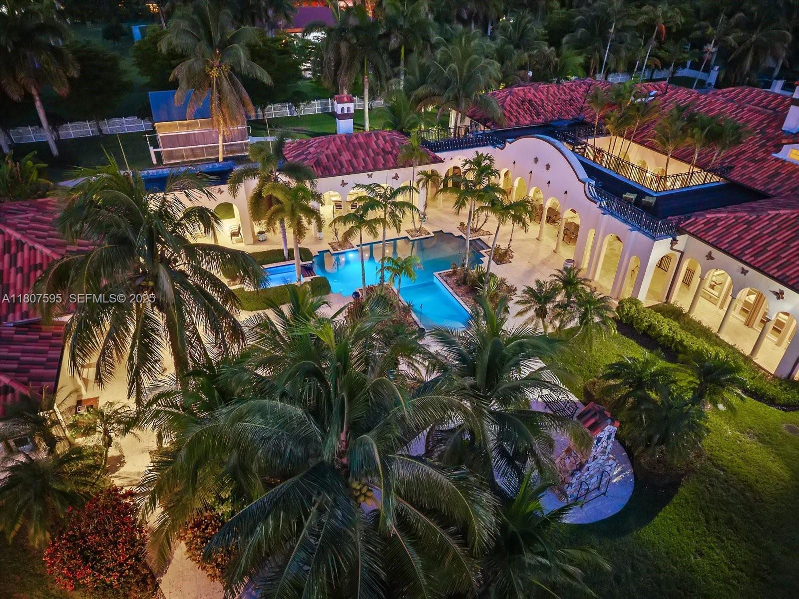 18451 Southwest 158th Street Miami, FL 33187 - Photo 5 of 45 a view of a table and chairs in patio
