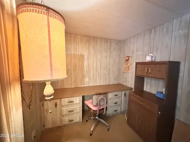 a bathroom with a sink a toilet a mirror and shower