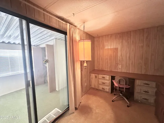 a bathroom with a sink double vanity mirror and a bathtub