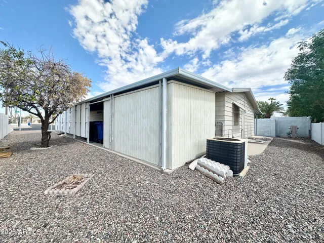 a view of a house with a dry yard