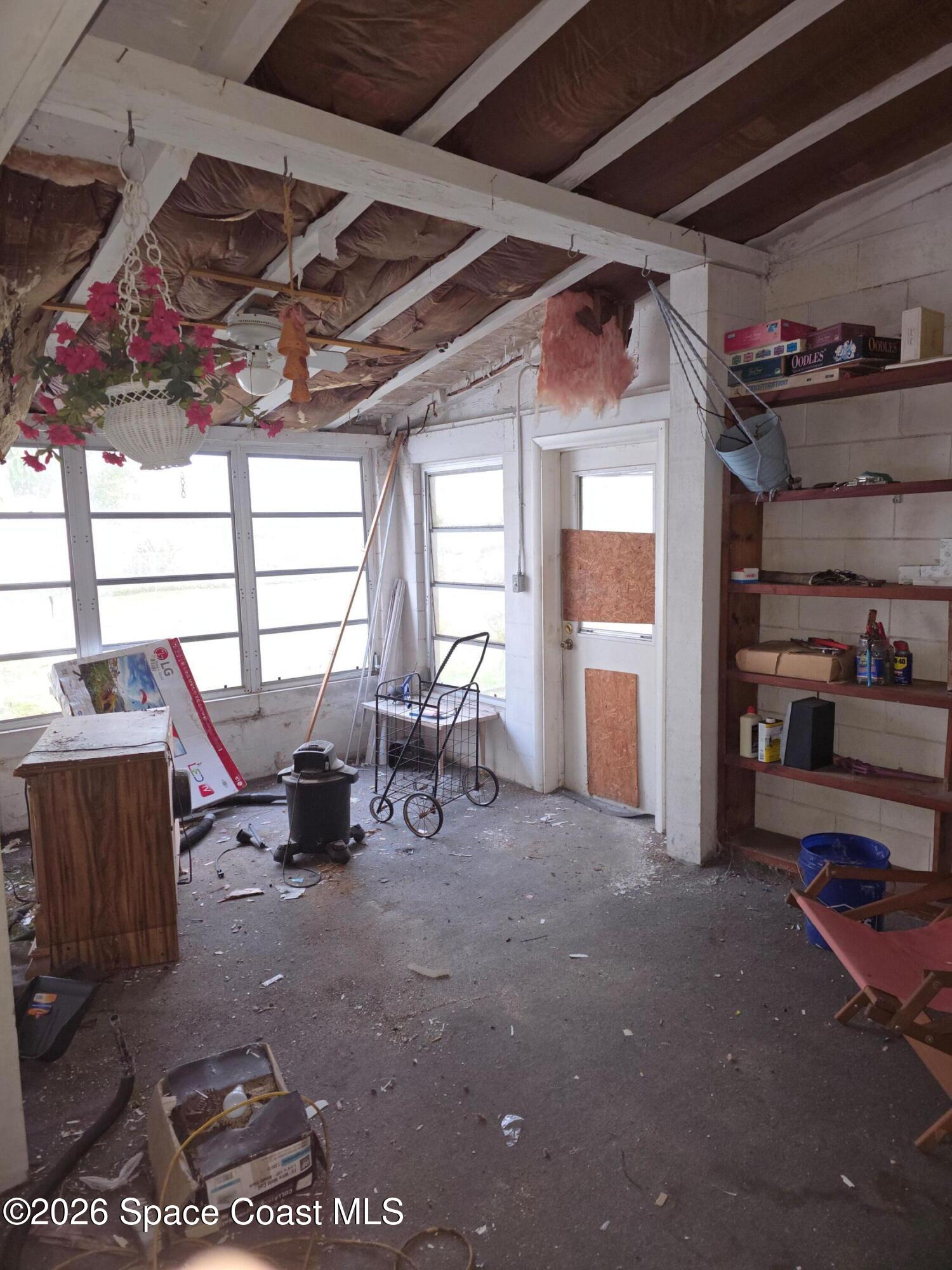 4365 Highway 1 Mims, FL 32754 - Photo 18 of 37 a view of a room with lots of furniture and a window