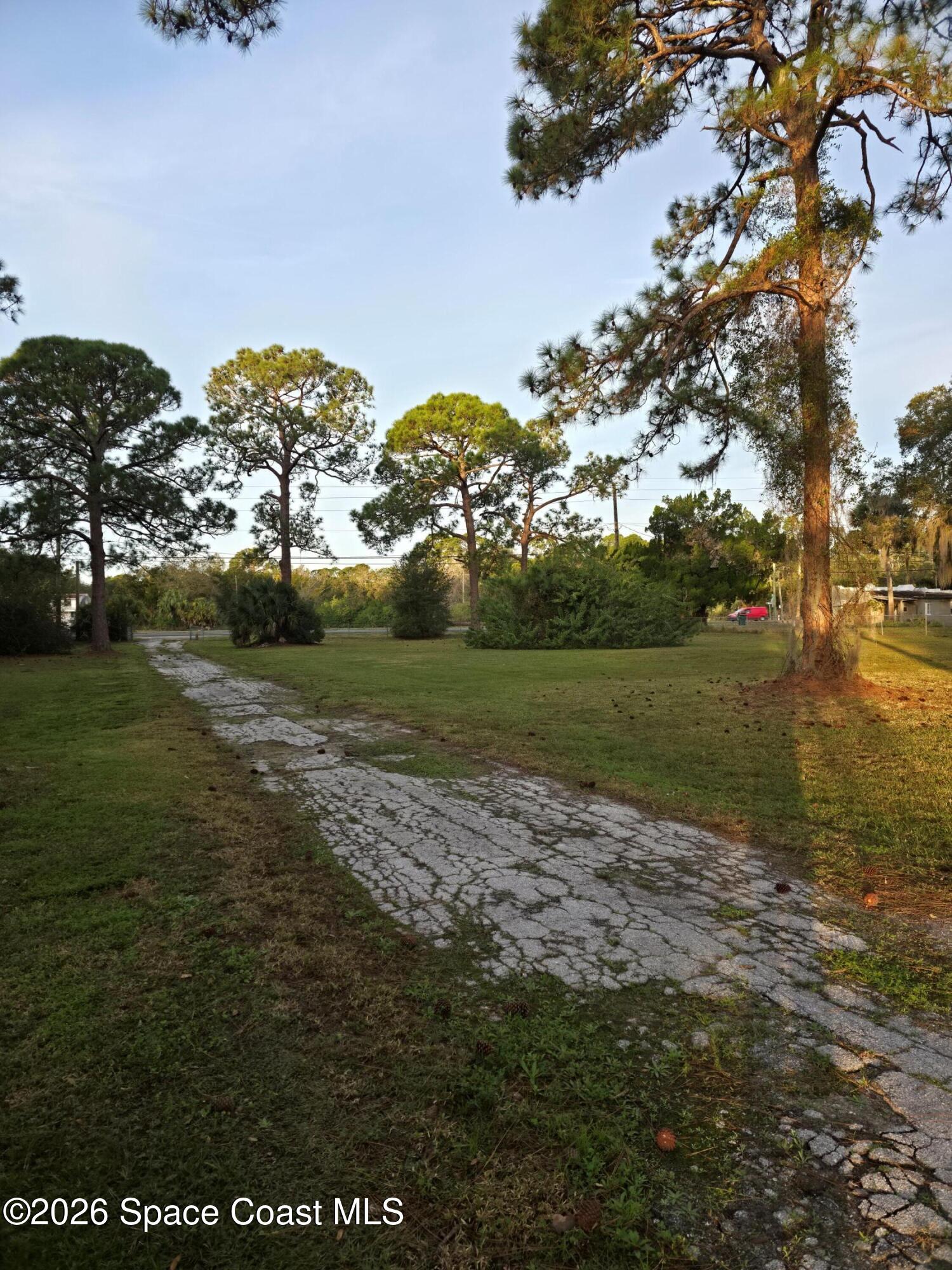 4365 Highway 1 Mims, FL 32754 - Photo 2 of 37 a view of a large body of water with a building in the background