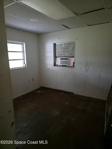 a view of a closet in an empty room