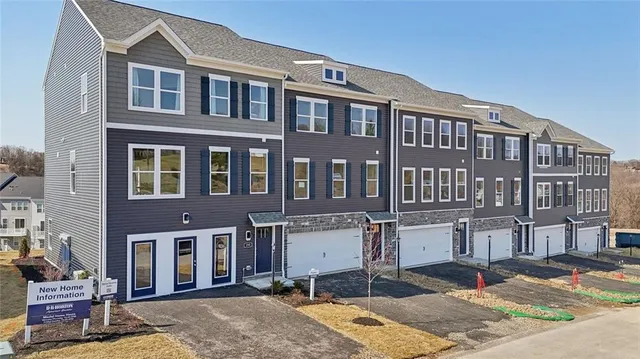 a front view of a building with street view
