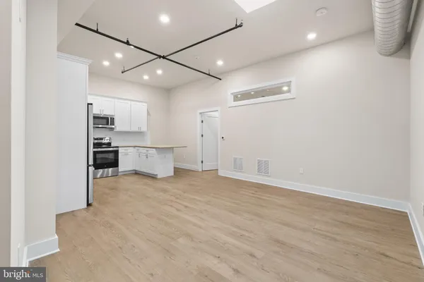 a black and white building with a outdoor space