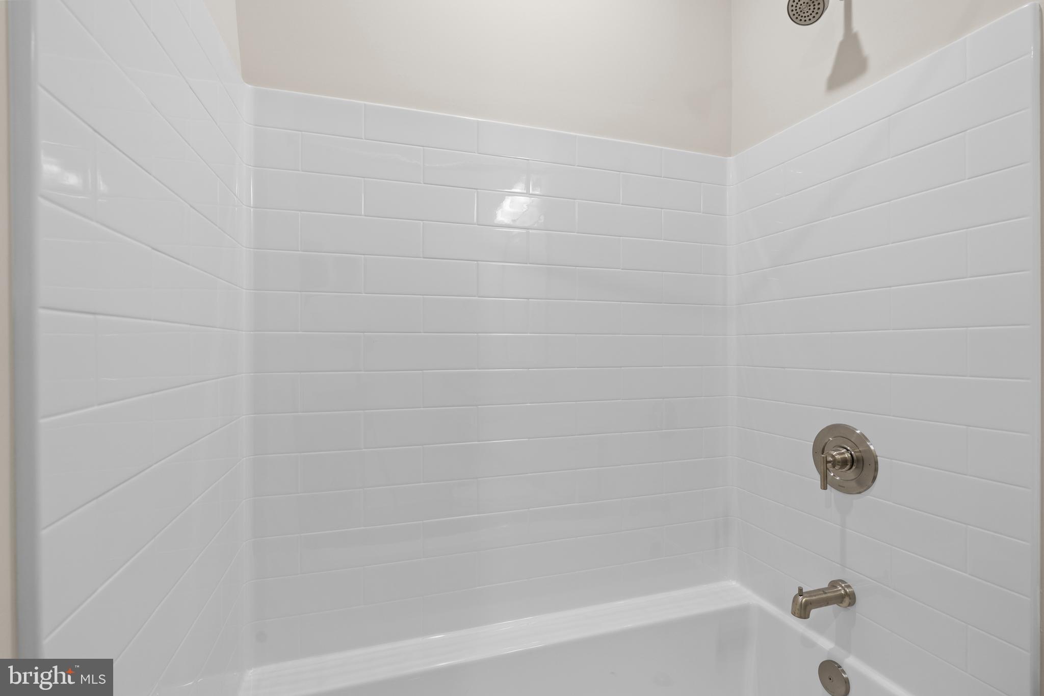 30 West Broad Street Souderton, PA 18964 - Photo 15 of 40 a bathroom with a bathtub