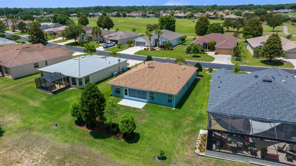 16193 Southwest 14th Avenue Road Ocala, FL 34473 - Photo 53 of 74 an aerial view of a house with garden space and street view