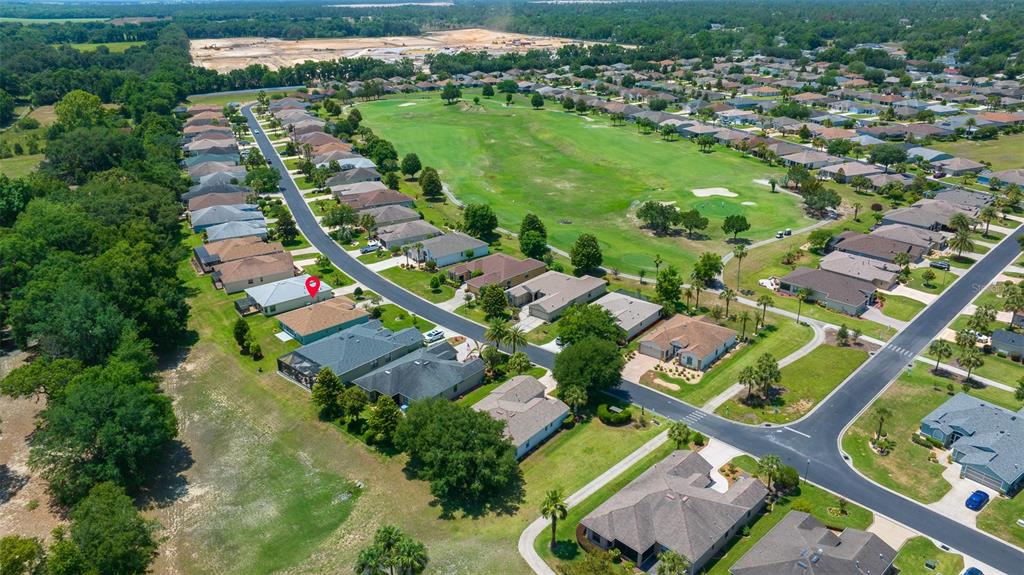 16193 Southwest 14th Avenue Road Ocala, FL 34473 - Photo 57 of 74 an aerial view of residential houses with outdoor space and river