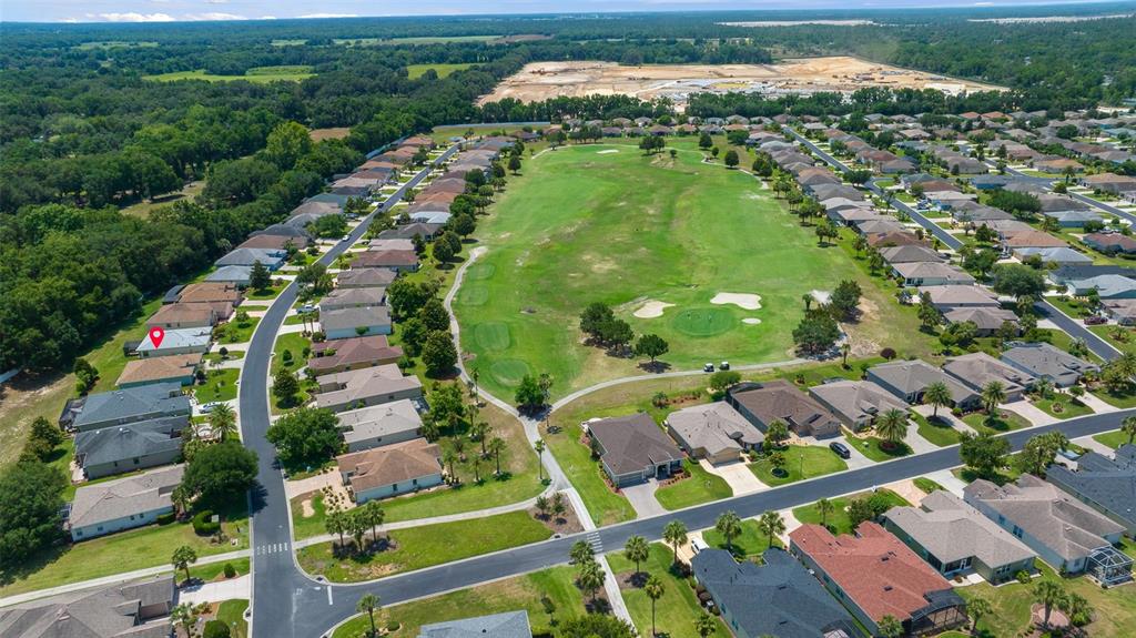 16193 Southwest 14th Avenue Road Ocala, FL 34473 - Photo 58 of 74 an aerial view of a residential houses with outdoor space and street view