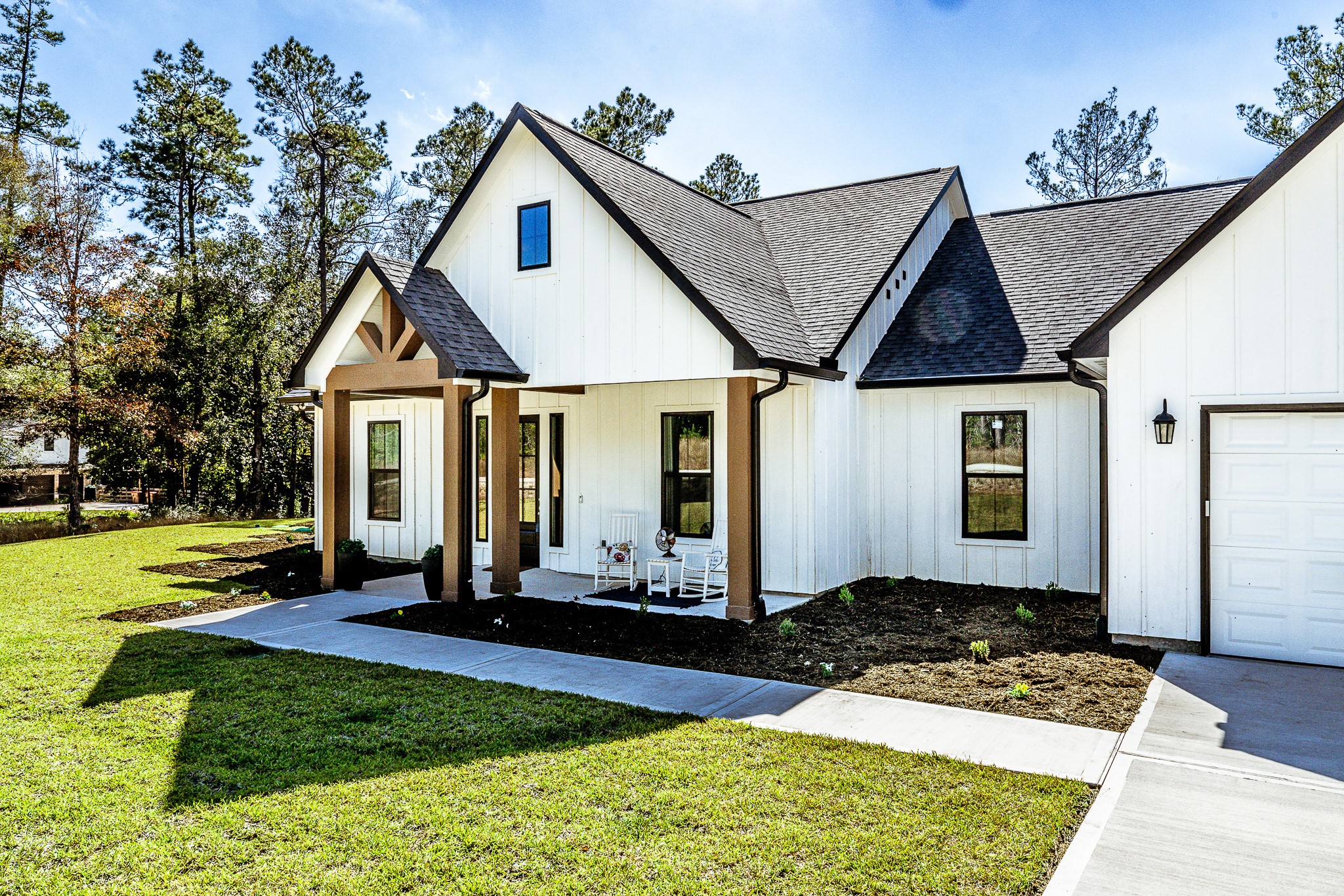 111 Eagle Run Road Willis, TX 77378 - Photo 6 of 44 Charming covered front porch featuring elegant wood accents.