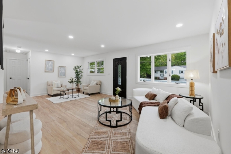 36 Ruth Street Hopatcong, NJ 07874 - Photo 3 of 25 a living room with furniture potted plant and a large window