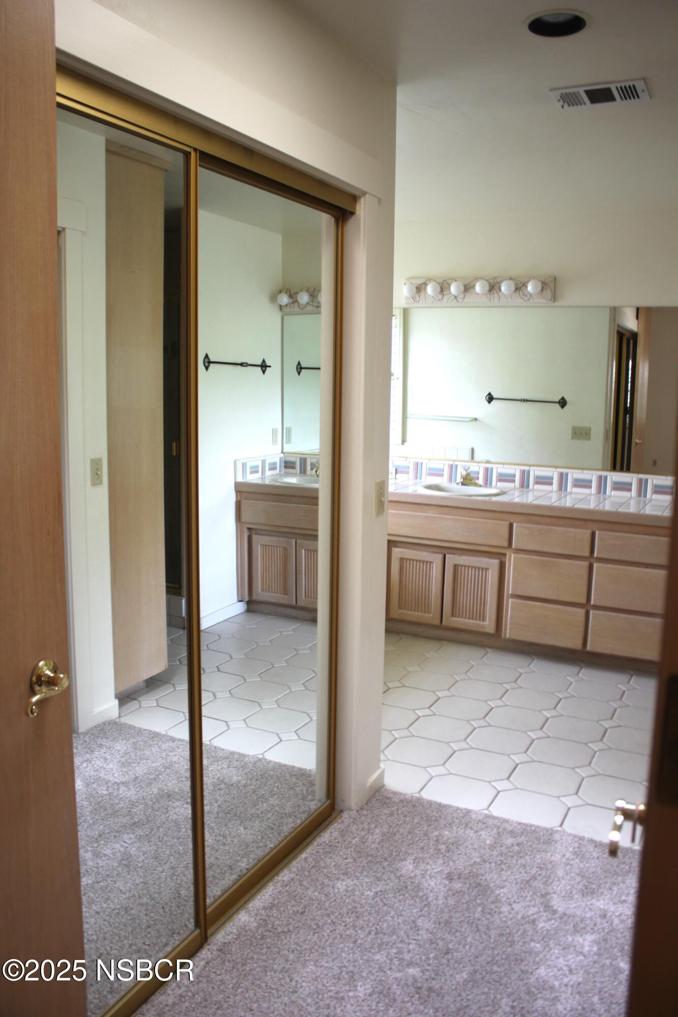1448 Holsted Drive Solvang, CA 93463 - Photo 22 of 33 a view of a bathroom with tub shower