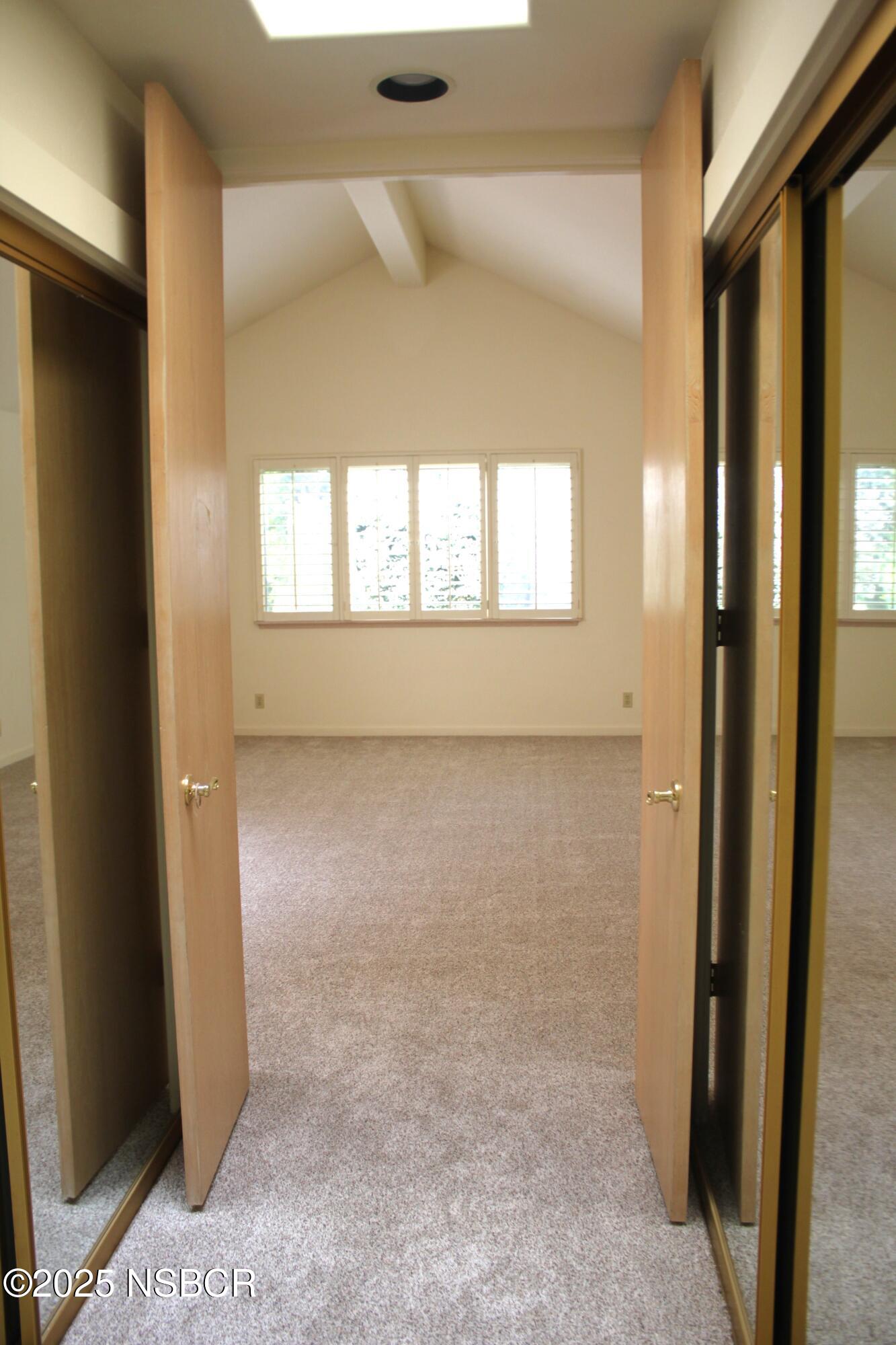 1448 Holsted Drive Solvang, CA 93463 - Photo 24 of 33 an empty room with windows
