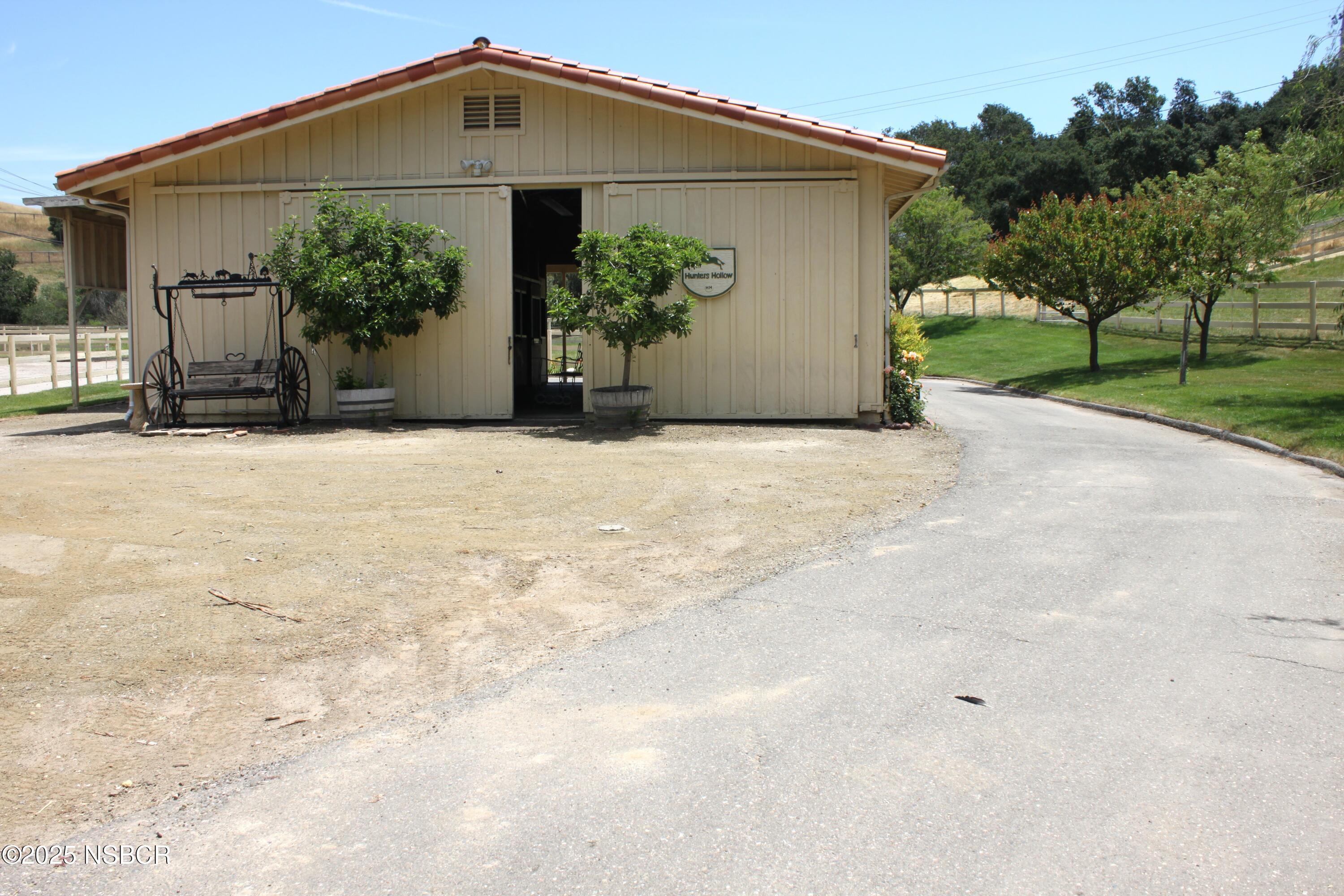 1448 Holsted Drive Solvang, CA 93463 - Photo 30 of 33 a front view of a house with garden