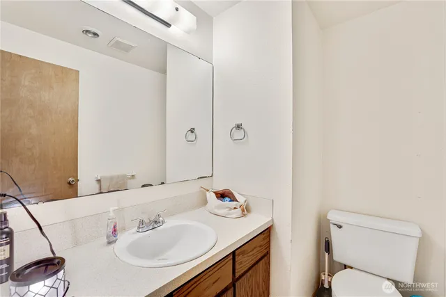 a bathroom with a sink and a toilet