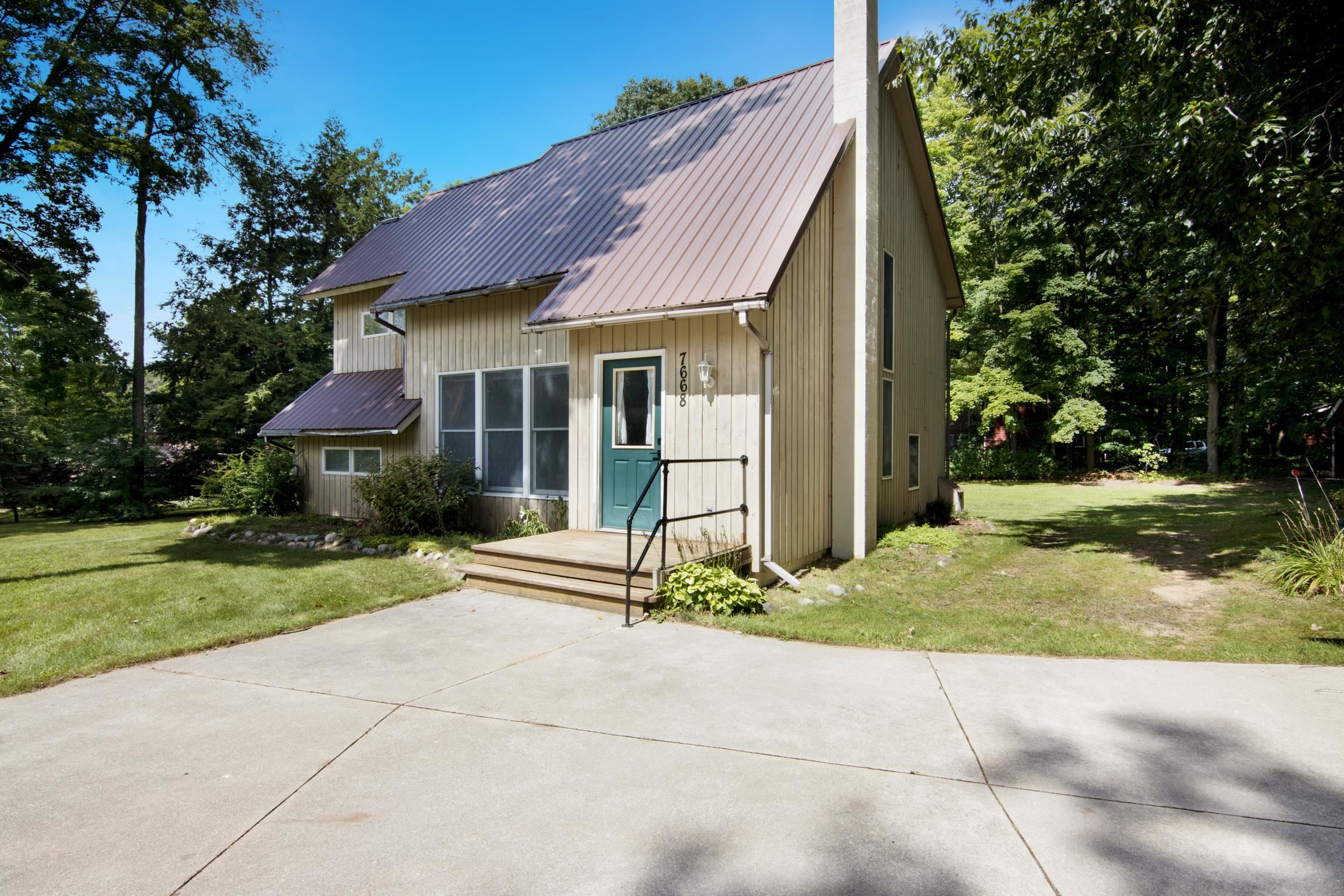 7668 Forest Lodge Road Traverse City, MI 49685 - Photo 2 of 30 1938134-84f438d2-27ff-400e-8c23-b42ed852e3ac.JPG