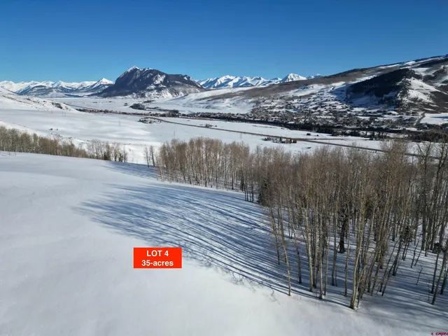 a view of a lake with a mountain in the background