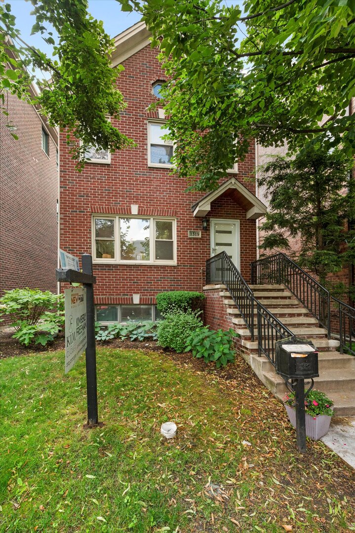 1319 West 32nd Place Chicago, IL 60608 - Photo 1 of 46 a front view of a house with garden