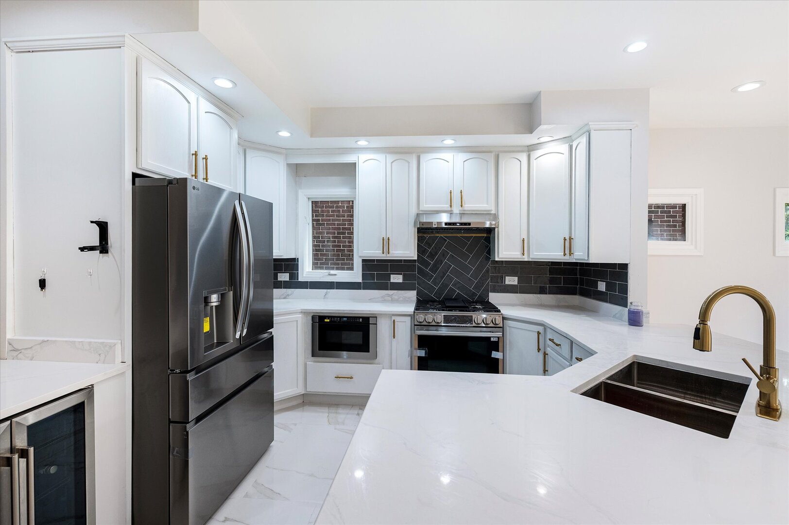 1319 West 32nd Place Chicago, IL 60608 - Photo 14 of 46 a kitchen with a refrigerator a stove a sink and a stove