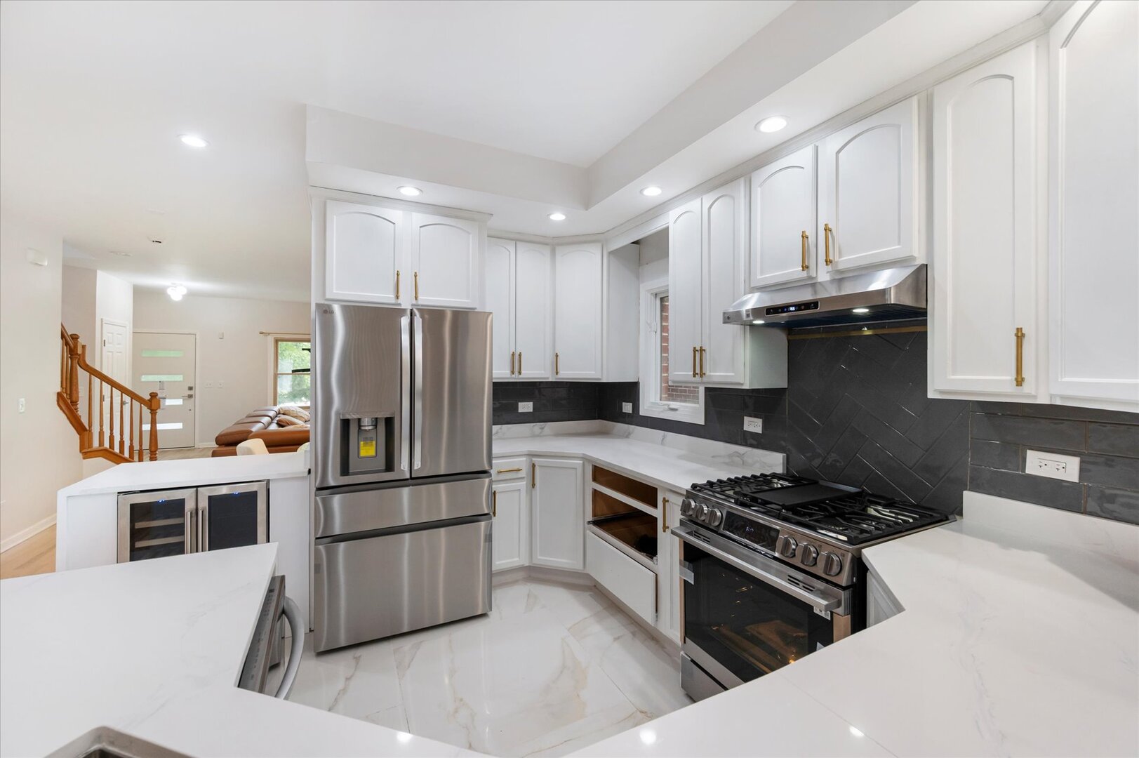 1319 West 32nd Place Chicago, IL 60608 - Photo 16 of 46 a kitchen with granite countertop a refrigerator stove and sink