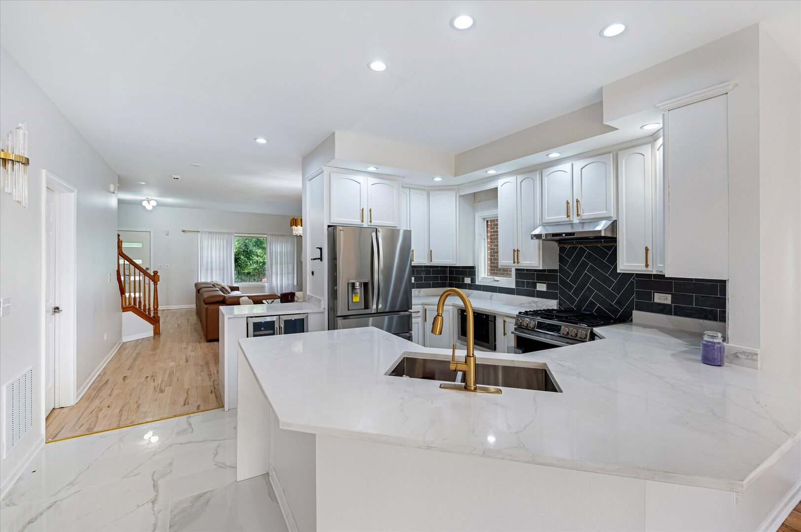 1319 West 32nd Place Chicago, IL 60608 - Photo 18 of 46 a kitchen with stainless steel appliances a stove a sink a microwave a refrigerator a counter top space and cabinets
