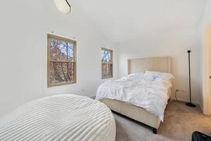 1319 West 32nd Place Chicago, IL 60608 - Photo 20 of 46 a bedroom with a bed and a window