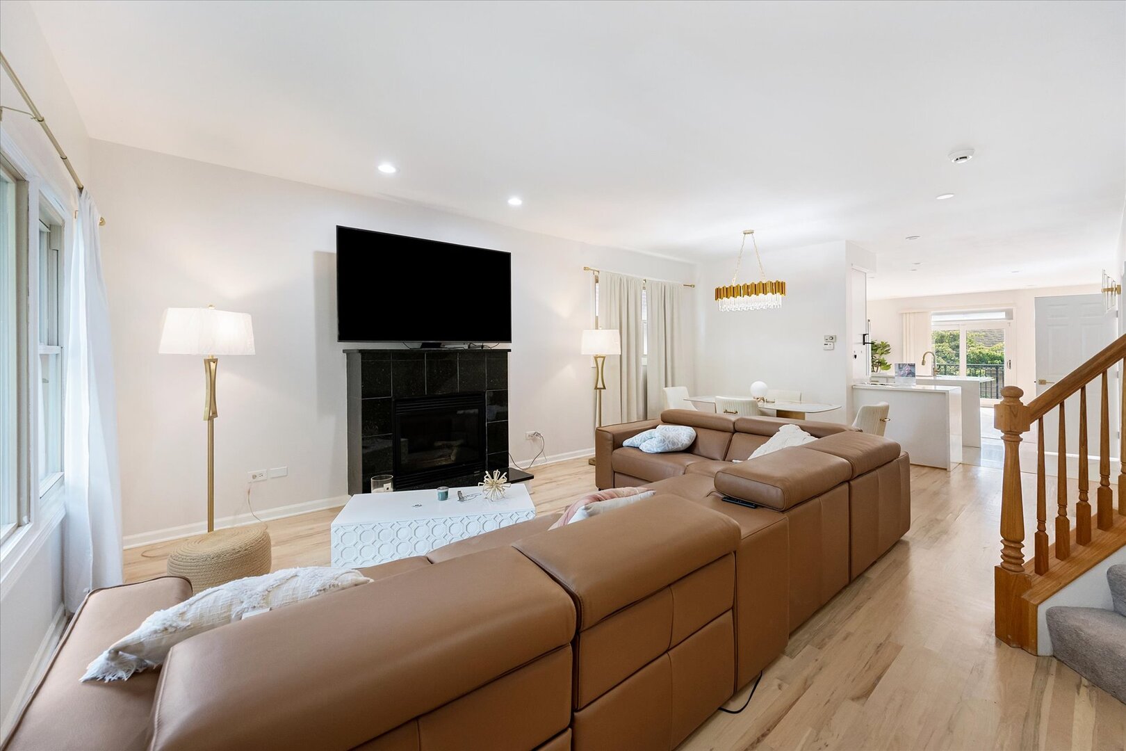 1319 West 32nd Place Chicago, IL 60608 - Photo 2 of 46 a living room with furniture and a flat screen tv