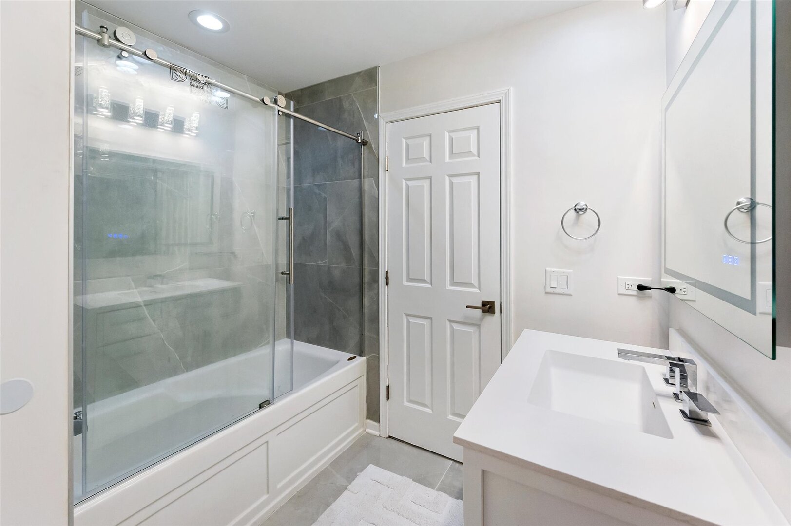 1319 West 32nd Place Chicago, IL 60608 - Photo 25 of 46 a bathroom with a bathtub and a sink