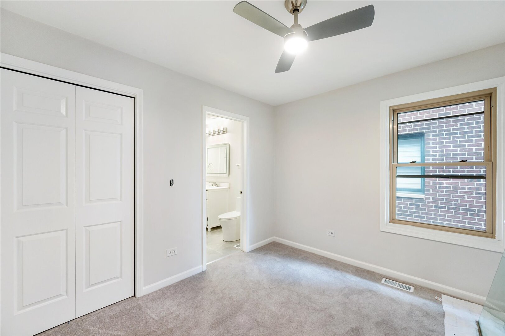 1319 West 32nd Place Chicago, IL 60608 - Photo 27 of 46 a view of an empty room with a window