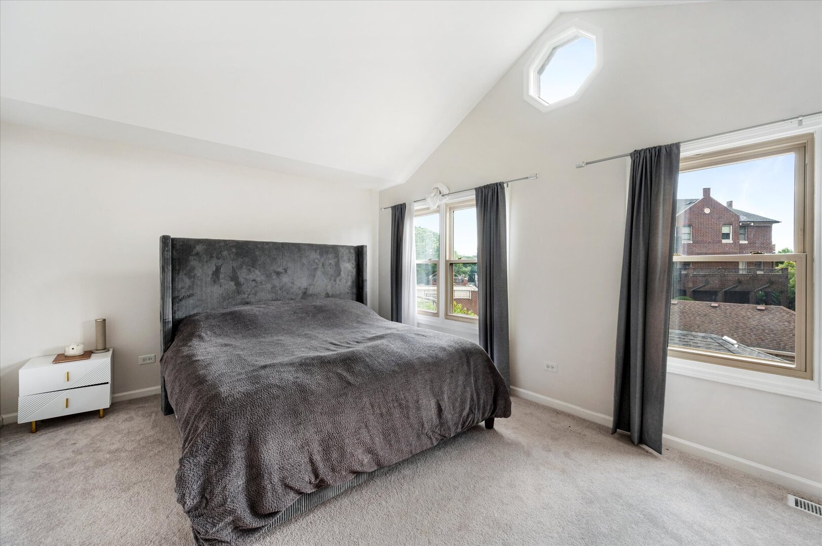 1319 West 32nd Place Chicago, IL 60608 - Photo 28 of 46 a bedroom with a bed and large window
