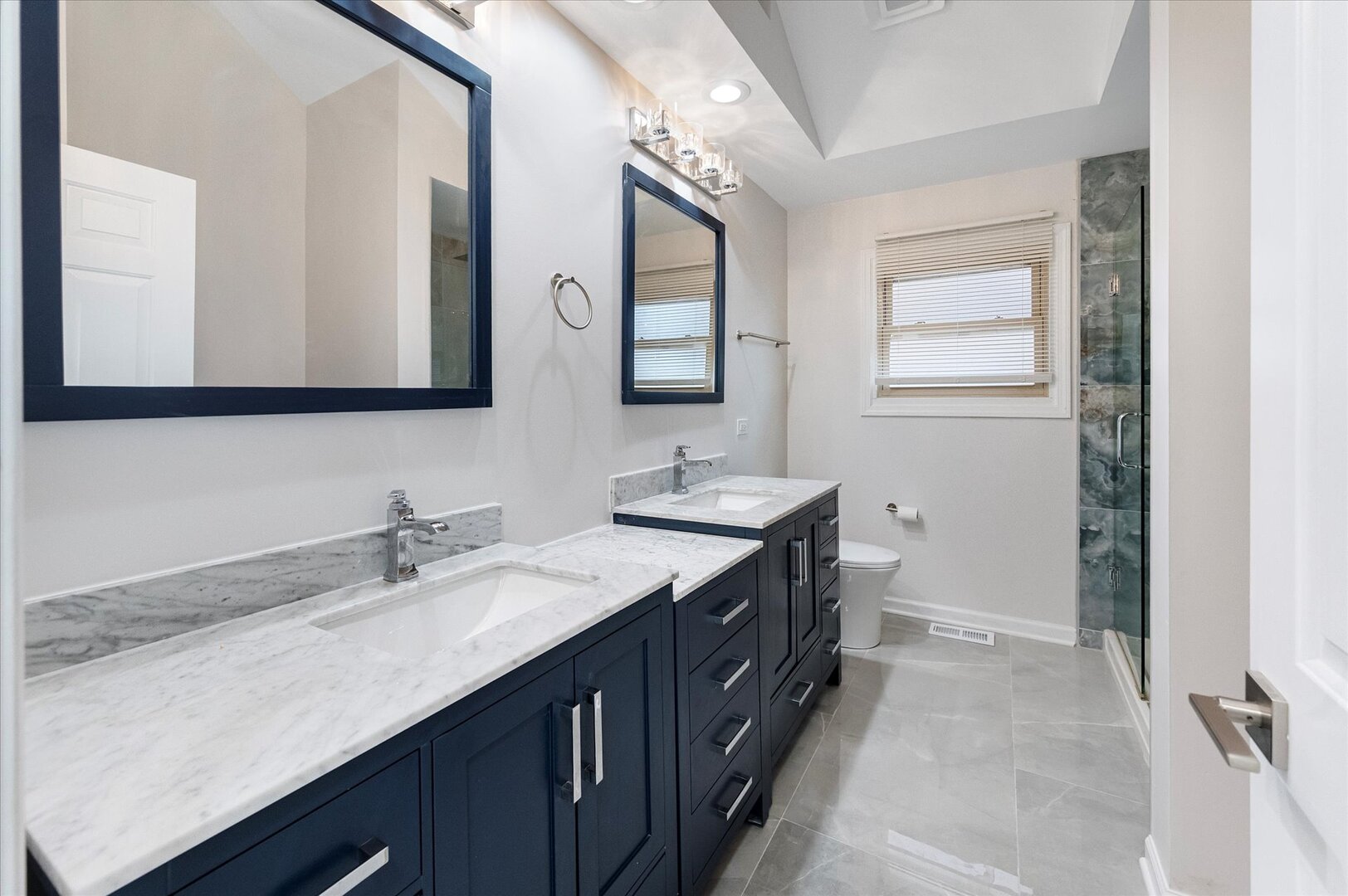 1319 West 32nd Place Chicago, IL 60608 - Photo 30 of 46 a bathroom with 2 sink and a mirror