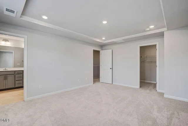 a bathroom with a shower sink and mirror