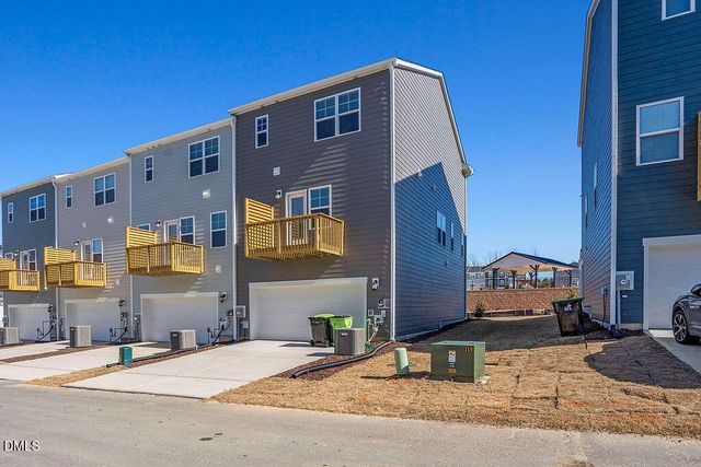 a house view with a backyard space