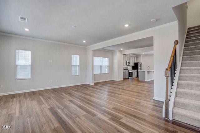 a view of entryway with wooden floor