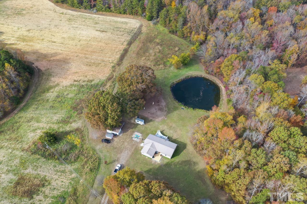 1231 Stoney Mountain Road Rougemont, NC 27572 - Photo 1 of 45 a backyard of a house