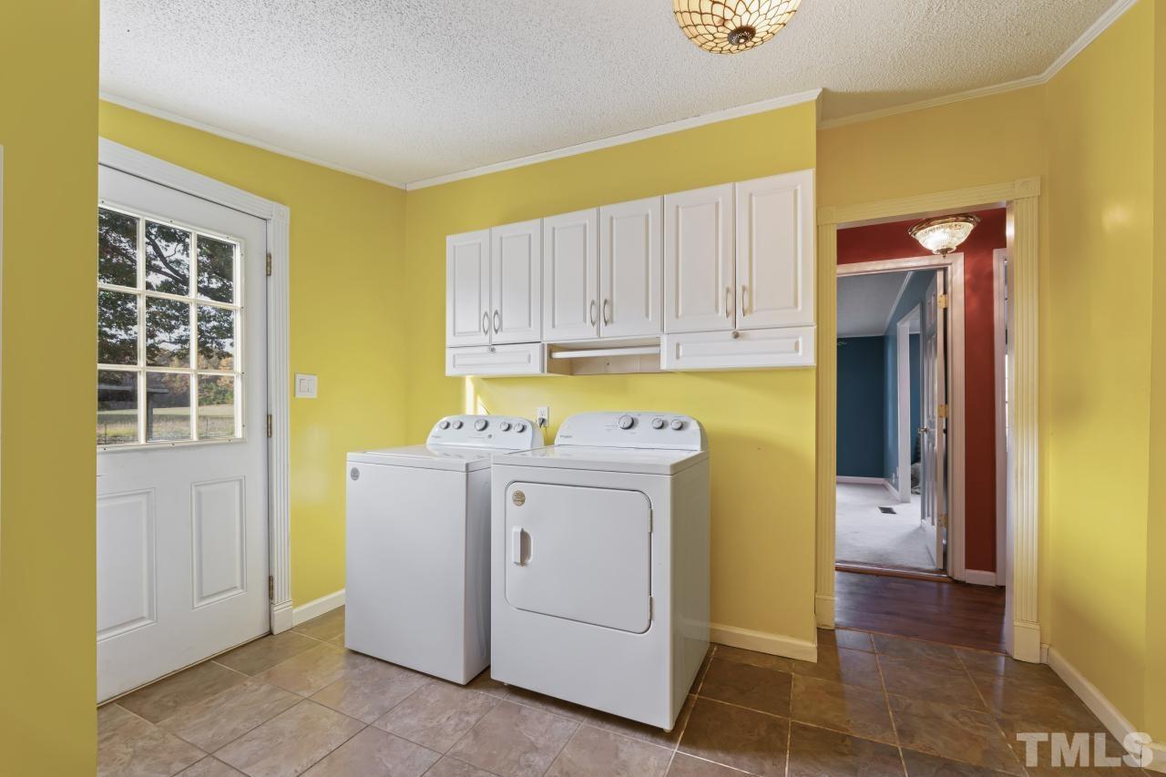1231 Stoney Mountain Road Rougemont, NC 27572 - Photo 13 of 45 a utility room with a sink